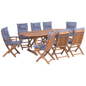 Ensemble de jardin Beliani Maui 9 pcs: table ovale extensible en acacia marron, 8 chaises pliantes avec coussins bleus.