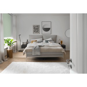Chambre avec store thermique vert Schöner Wohnen Martha à la fenêtre.