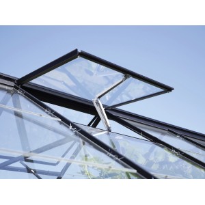 Ventilatore automatico da tetto Thermovent aperto in alluminio-zinco su una serra.