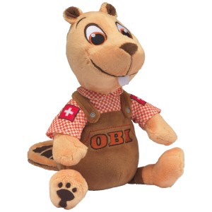 Peluche OBI Svizzera-Castoro con salopette e camicia a quadri, seduto.