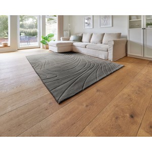 Tappeto a pelo alto Andiamo Dale antracite, 160x230 cm, con motivo moderno a linee curve in soggiorno.