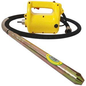 Arwin CV2300 vibratore per calcestruzzo: Motore giallo con ago vibrante per compattare il calcestruzzo.
