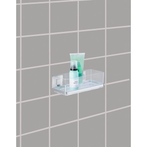Étagère murale Wenko Vacuum-Loc® Quadro en acier inoxydable avec produits de bain sur carrelage gris.
