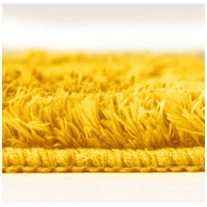 Tappeto bagno giallo Spirella Fino (40x60 cm) con pelo morbido. Tappeto per un maggiore comfort in bagno.