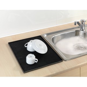 Tappetino scolapiatti nero Wenko Maxi (40x30 cm) accanto a un lavello con stoviglie. Ideale come scolapiatti.