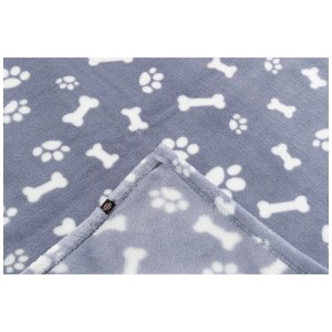 Couverture pour chien Trixie Kenny bleue (100x75 cm) avec motifs os et pattes.