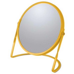 Specchio cosmetico giallo Spirella Akira con supporto e ingrandimento.