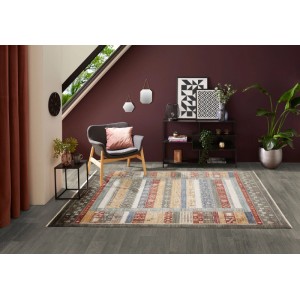 Tappeto Luxor Living Rocco, motivo etnico a strisce multicolore verde, rosso, oro, beige in soggiorno. Poliestere.