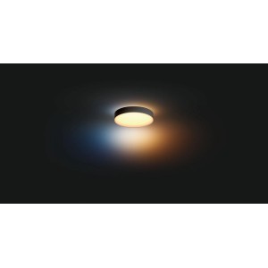 Plafoniera nera Philips Hue Enrave M con dimmer e luce bianca calda.