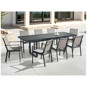 Moderno set mobili da giardino Beliani Valcanetto/Busseto: tavolo allungabile nero in alluminio, 8 sedie grigie su terrazza.