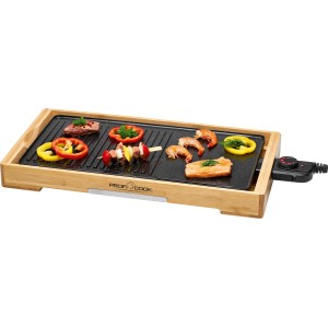 Griglia Teppanyaki TYG 1143 con cornice in bambù e cibo grigliato come carne, verdure e gamberi.