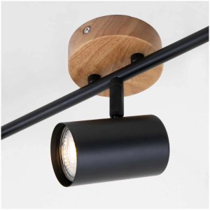 Gros plan : Spot noir Briloner Muritz avec base en bois, 3 lampes, pour ampoules GU10.