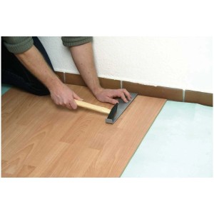 Kit de pose pour stratifié et parquet Wolfcraft 22 pièces utilisé avec tire-lame et marteau.