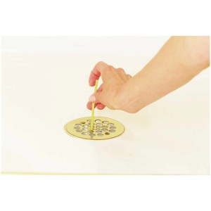 Applicazione: Sani Sticks Lemon detergente per scarichi inserito in uno scarico.