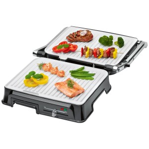 Grill a contatto Clatronic KG3571 con cibo sulle superfici di cottura.