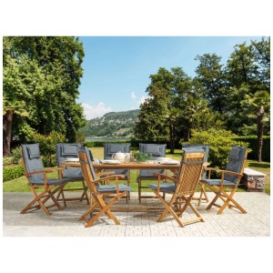 Salon de jardin Beliani Maui: table ovale extensible en acacia, 8 chaises pliantes et coussins graphite au jardin.