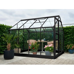 Serre noire Halls Popular 86 avec plantes et table, 5 m² avec cadre de fondation.