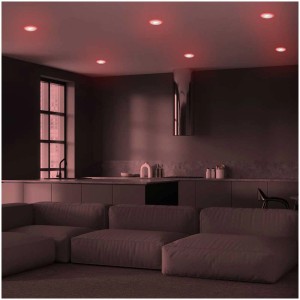 Faretti da incasso a LED Briloner Skill Color, set da 3, cromo opaco, con luce colorata in un moderno soggiorno.