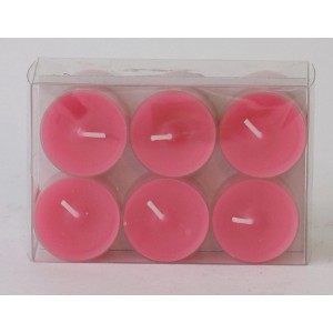 Six bougies chauffe-plat fuchsia dans des supports en plastique. Bougies pour une lumière d'ambiance.