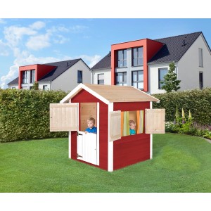 Cabane de jeu rouge Weka Drachenhöhle Tabaluga avec deux enfants dans le jardin.