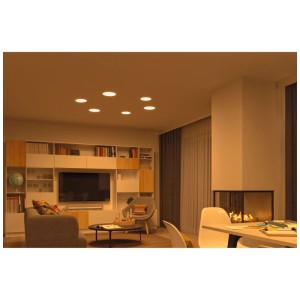 Salon avec plusieurs panneaux LED encastrables Paulmann Veluna VariFit, lumière blanche chaude.