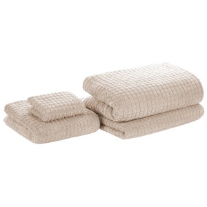 Ensemble de 4 serviettes en coton beige Atai avec texture gaufrée.