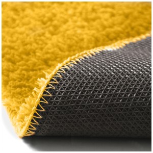 Dettaglio: Tappeto bagno giallo Spirella Fino (40x60 cm) con fondo antiscivolo.