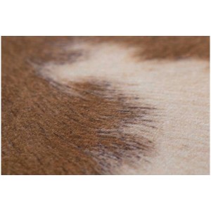 Dettaglio: Tappeto in finta pelliccia Amarillo color crema-marrone, effetto pelle di mucca.
