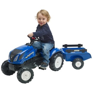 Trattore blu Falk New Holland con rimorchio (taglia M) per bambini in giardino.