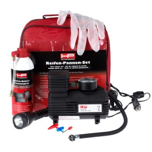 Reifen-Pannen-Set mit Reifen-Doktor, Kompressor, Handschuhen und Lampe in roter Tasche.