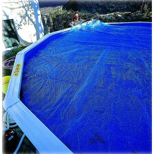 Bâche thermique bleue Colibri sur piscine Dream-Pool ronde Ø 345 cm. La couverture protège contre la perte de chaleur.