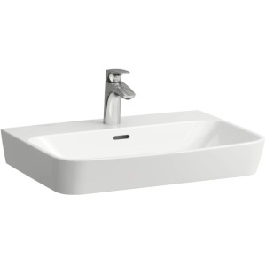 Vasque en céramique blanche Laufen Moderna R avec robinet pour WC invités.