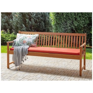 Coussin de banc rouge Beliani Vivara (5x169x50 cm) sur banc de jardin avec coussin et plaid.