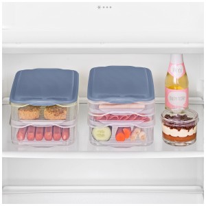 Set contenitori per alimenti Rotho Foodcenter 2 Rondo in frigo con salsiccia, formaggio, verdure e dessert.