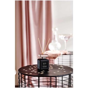 Ipuro diffuseur d'ambiance Essentials Time for Party 50ml sur table avec décoration.