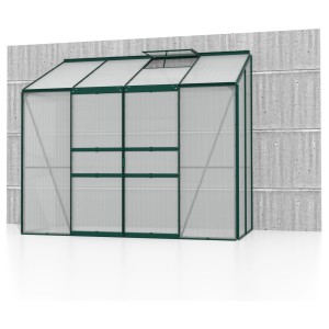 Serra da appoggio verde Vitavia Ida 3300 con pannelli in policarbonato contro un muro. Ideale per terrazzi e balconi.