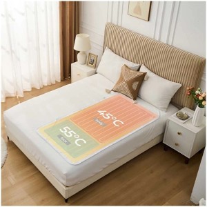 Coperta termica Sonnenkönig Milly White sul letto, con indicazione della temperatura per piedi e corpo.