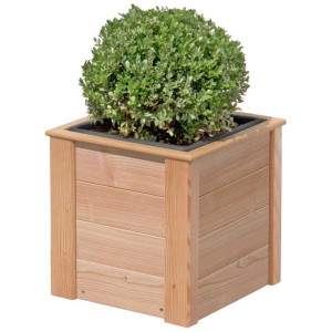 Jardinière carrée en mélèze avec insert et plante.
