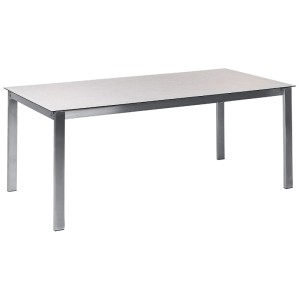 Table de jardin rectangulaire avec plateau verre-céramique clair et structure en acier inoxydable. Set Beliani.