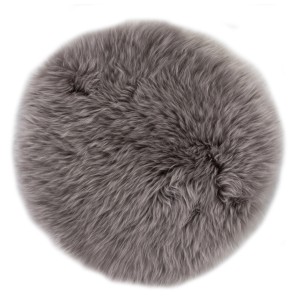 Coussin d'assise rond en peau de mouton taupe, Ø 34 cm. Accessoire de maison confortable.
