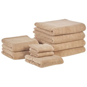 Set de 9 serviettes beige Beliani Mitiaro en coton éponge avec motif zigzag.