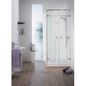 Breuer Firstclass Pendeltür mit Seitenwand links, rahmenlose Duschtür aus Glas mit Chrom-Beschlägen.