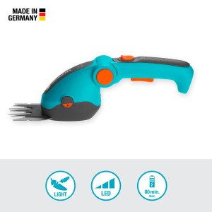 Cisailles à gazon sans fil Gardena ComfortCut Li avec câble de charge USB-C et affichage LED.