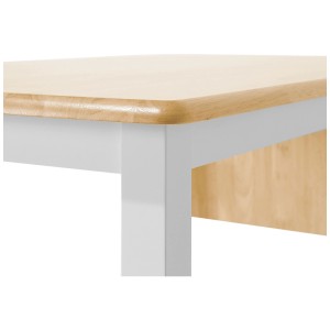 Gros plan : Table de salle à manger Beliani Louisiana en bois d'hévéa avec pieds laqués blancs.