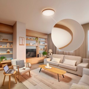 Plafonnier LED Philips Stylique 30 cm aspect bois, lumière blanc chaud, installé dans le salon.