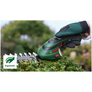 Cisailles à gazon et à arbustes sans fil Bosch Isio en utilisation avec des gants de jardinage.