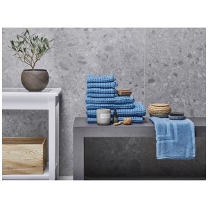 Ensemble de serviettes Beliani Areora bleu, 9 pièces, en coton avec texture gaufrée.