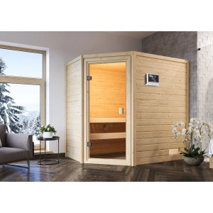 Sauna Woodfeeling Jella con porta in vetro bronzato e stufa in soggiorno.