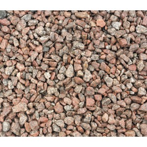 Gravillons de granite rouge (5-8 mm) pour allées de jardin et zones décoratives.