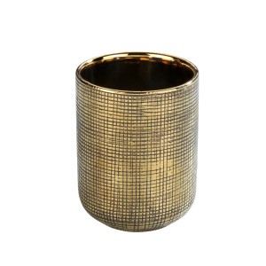 Goldener Wenko Zahnputzbecher Rivara aus Keramik mit strukturierter Oberfläche.
